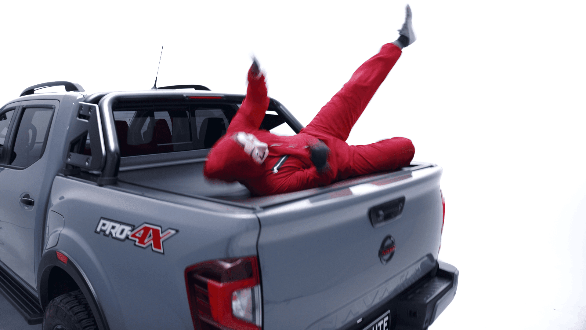 Showcasing the Roller Covers strenght as a person falls on the ute cover
