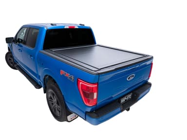 Ford F-150 with 5'5" tub fitted with roller shutter, offering secure and low-profile bed protection for work and recreation.