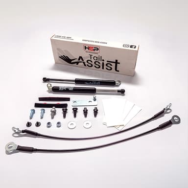 HSP Tail Assist kit components including struts, brackets, bolts and installation hardware laid out on white background