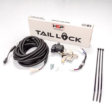 HSP Tail Lock kit components including wiring loom, connectors, control module and mounting hardware laid out on white background