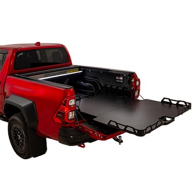 Red Toyota Hilux SR5 with HSP load slide extended side rear angle showing full extension