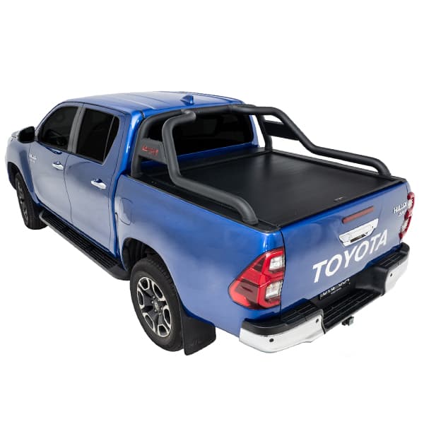 Blue Toyota Hilux SR5 with roll top and roller cover closed rear three-quarter studio image