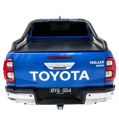 Blue Toyota Hilux SR5 with roll top and roller cover closed rear view