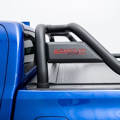 Blue Toyota Hilux SR5 sports bar detail close-up showing mounting over tub