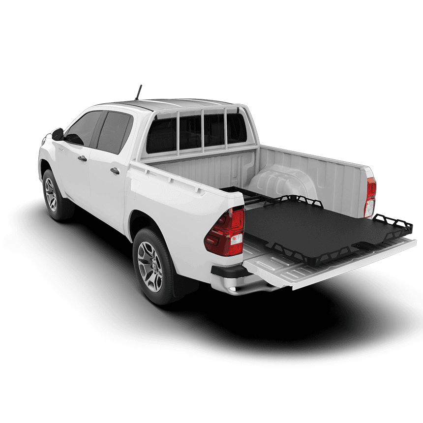HSP Load Slide tray installed in Toyota Hilux SR J-Deck tub, rear view with tray extended for easy cargo access.