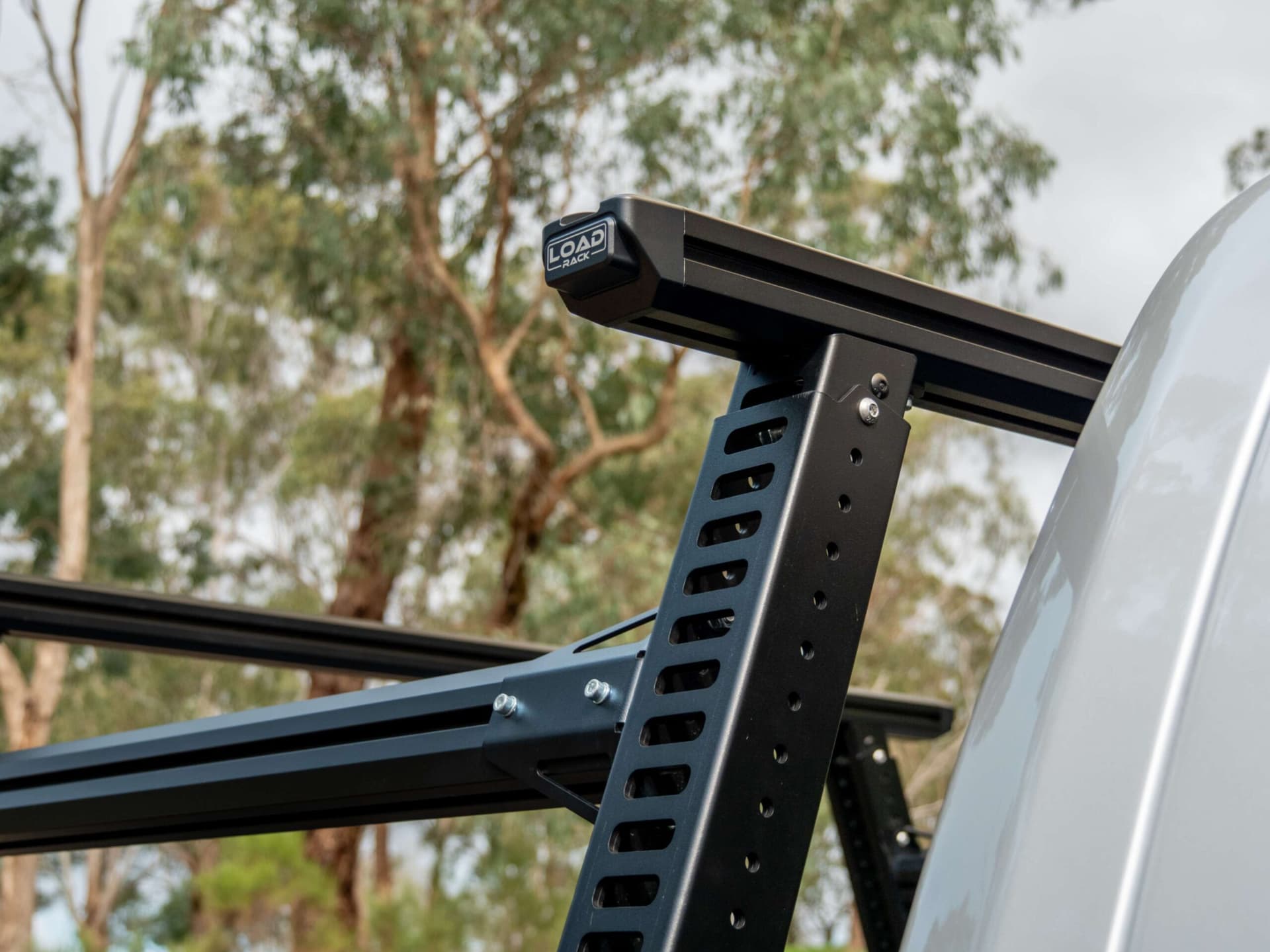 Close-up image of alloy ladder rack construction, showcasing lightweight yet durable materials used for ute load support.