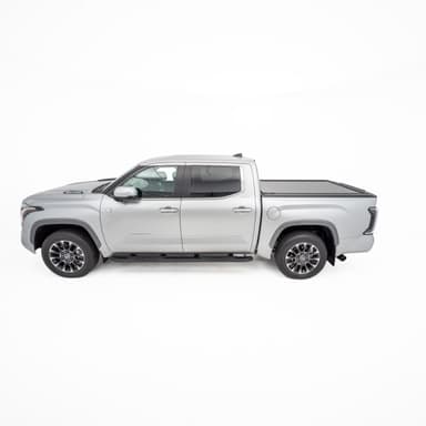 Side view of silver Toyota Tundra dual cab fitted with closed HSP Roller Cover