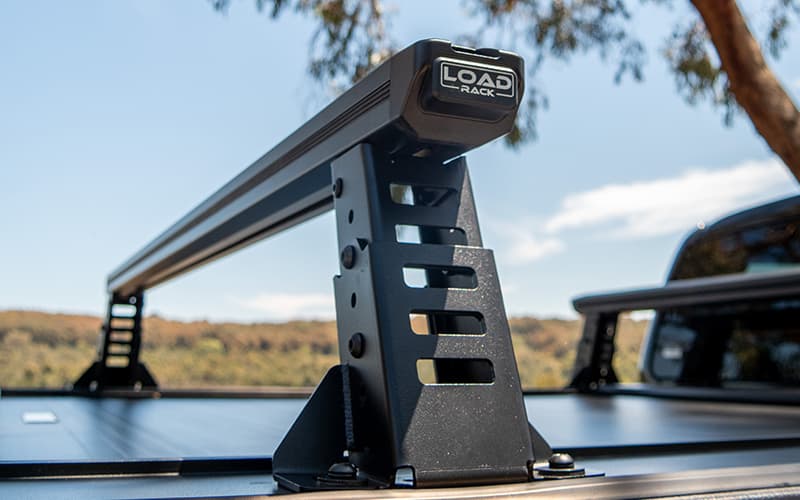 Close-up of ute tub rack mounted on roller cover, showcasing secure fitment and low-profile design.