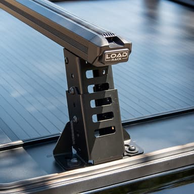 Showing a close up of the ute tub rack, with its black powder finish & strong alloy, as well as it's crossbars showing its universal channels.
