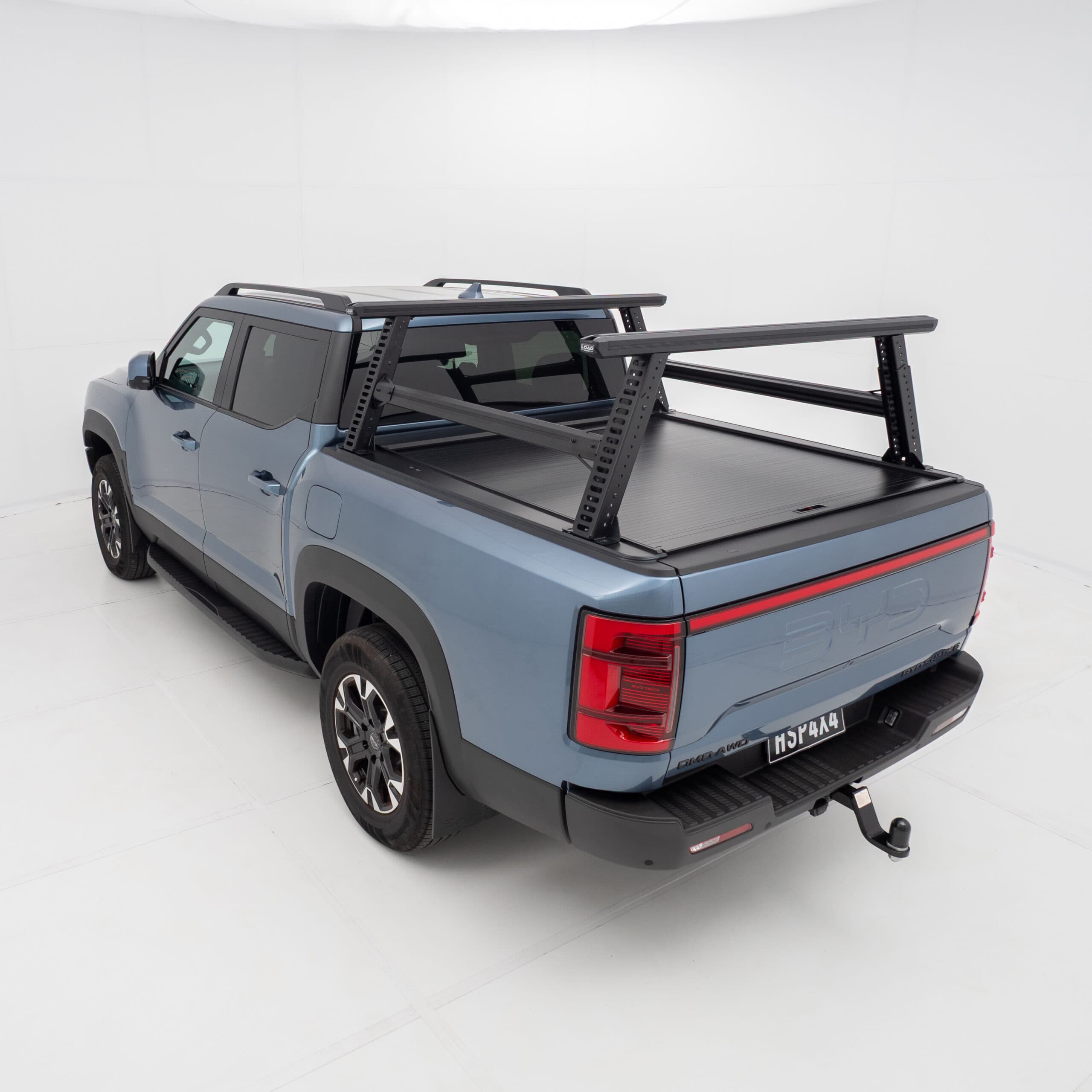 BYD Shark 6 ladder rack fitted to HSP Roller Cover, designed for rooftop load support, ladders, and trade accessories.