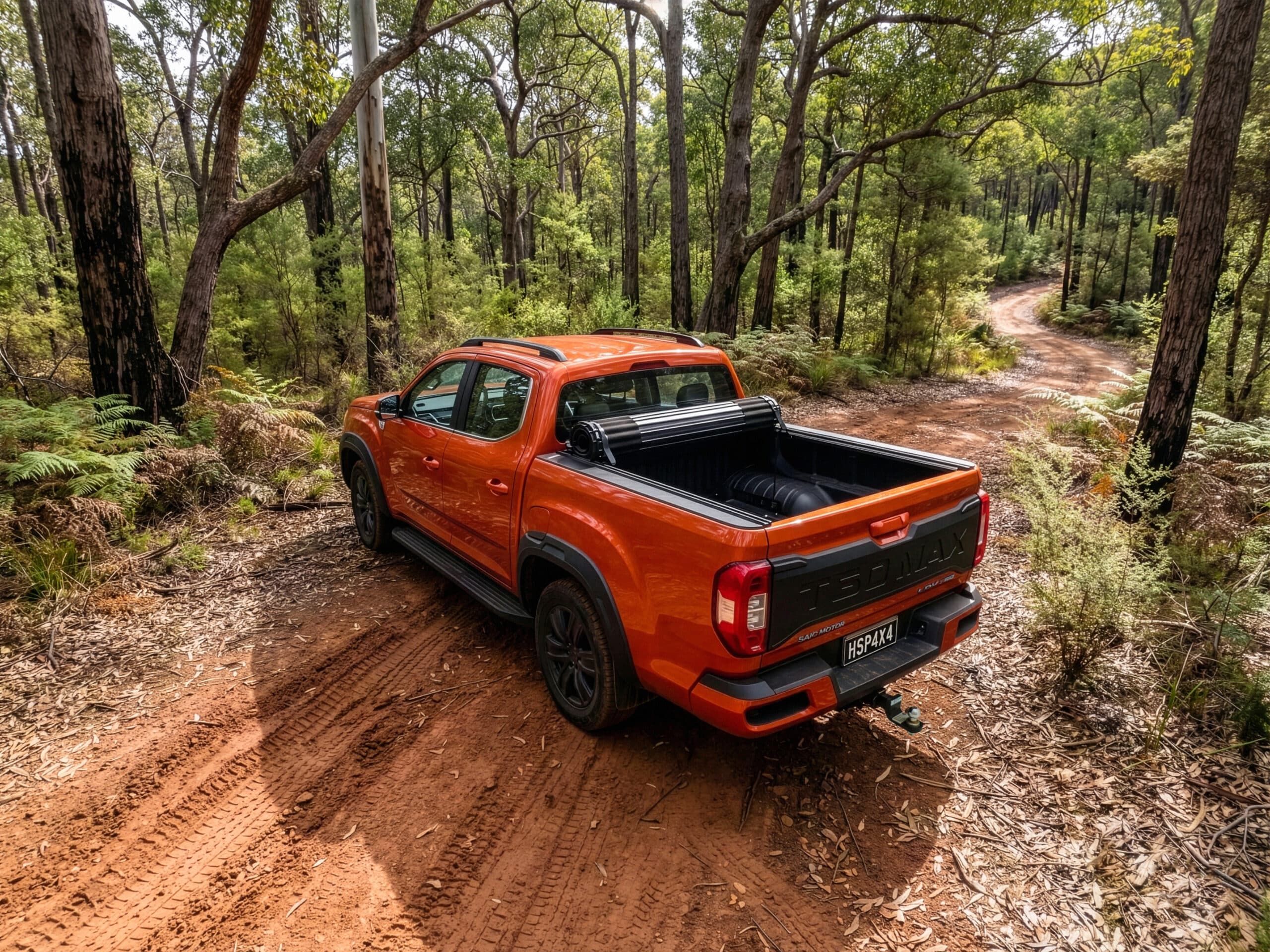 LDV T60 Tonneau Cover: HSP Roll Mate rolled open over the ute tub of a dual cab, three-quarter view