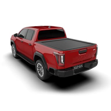 HSP Electric Roller Cover fitted to red 2026 Toyota Hilux dual cab, rear three quarter view showing the cover in the closed position