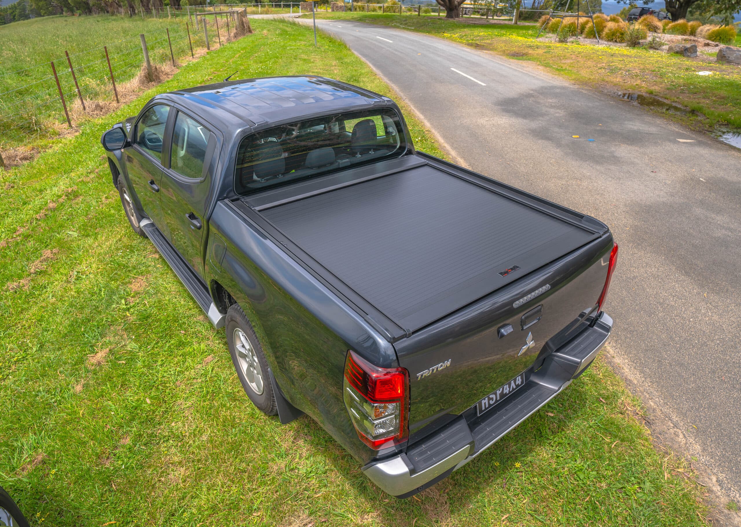 HSP Roller Shutter: Roll R Cover closed over the ute tub on a Mitsubishi Triton