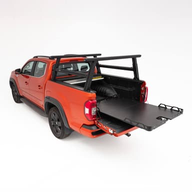 Universal Load Slide: Australian-made HSP dual cab ute tray slide extended past the open tailgate, three-quarter view