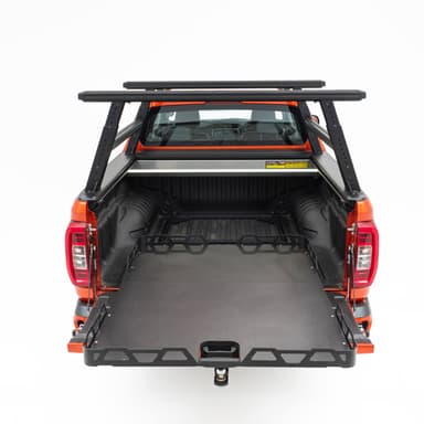 Universal Load Slide: Australian-made HSP dual cab ute tray slide fully extended from the tub for cargo access, rear view