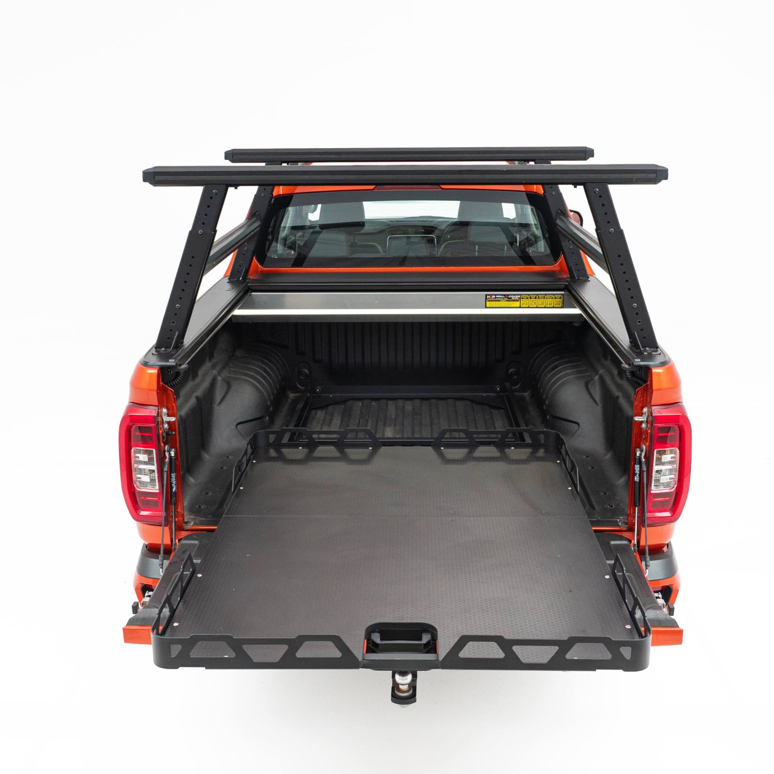 Universal Load Slide: Australian-made HSP dual cab ute tray slide fully extended from the tub for cargo access, rear view